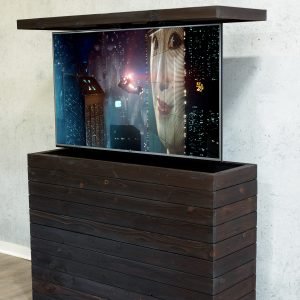 An outdoor hidden TV lift cabinet with neutral background in Shou Sugi Ban Charred Cedar cladding.