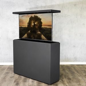 An outdoor hidden TV lift cabinet in all metal clad, river stone color, to watch your favorite sport or movie in your outdoor living space.