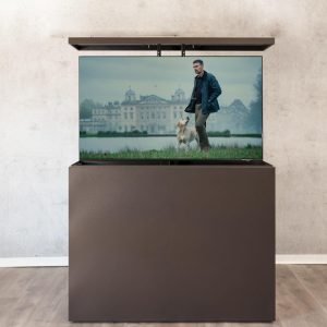An outdoor hidden TV lift cabinet in all metal clad, bronze rock color, for outdoor use on a patio, balcony, porch or in your pool area.